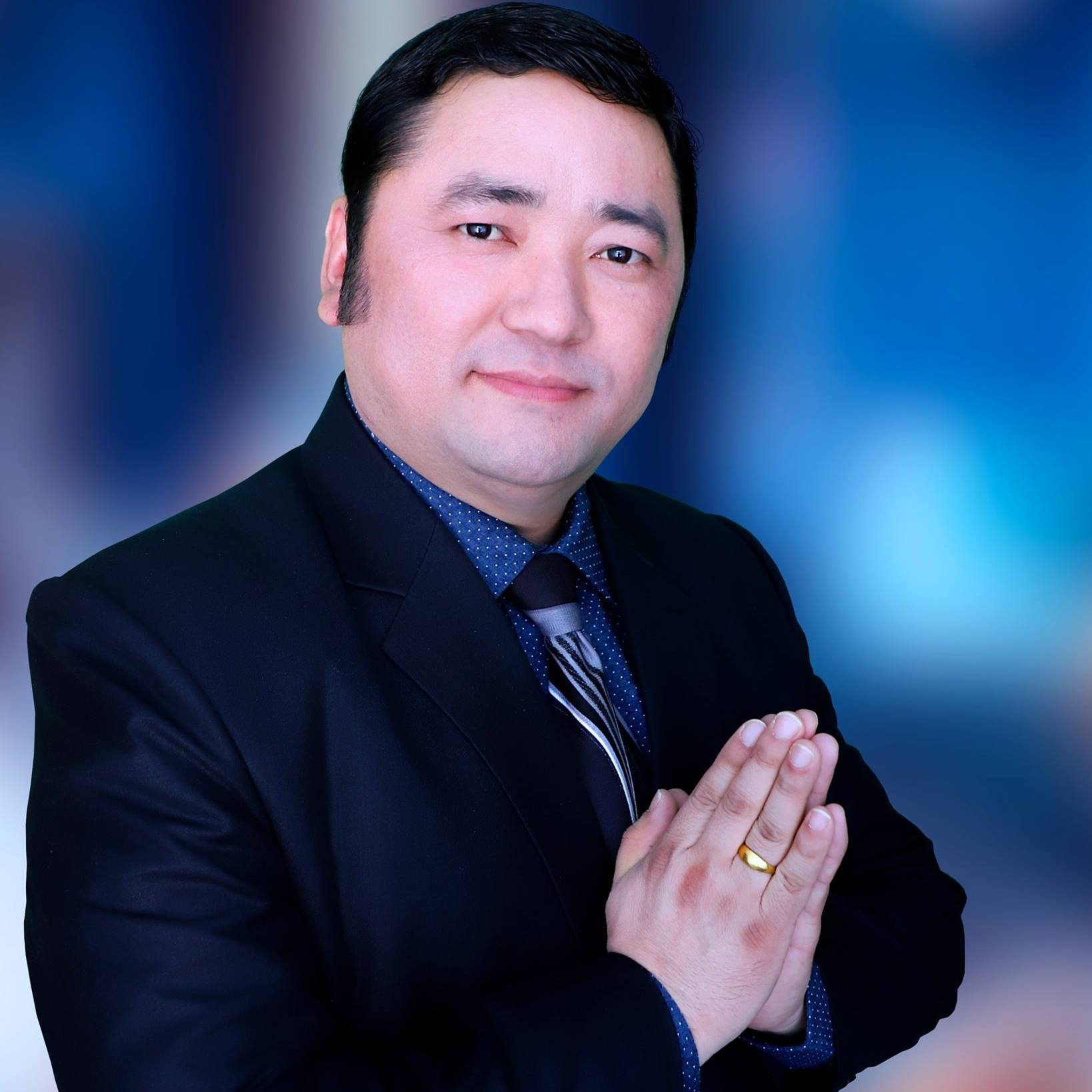 www.triratnafoundation.com Dr. Kumar Gurung is the Chairman & CEO of Triratna International Foundation (TIF) and the CEO cum Co-owner of the American Skyline Investment Group (ASI Group) and Gurung Brothers Real Estate companies he founded in the US. He is an entrepreneur, social worker, spiritual Master, Lawyer, Business Analyst, Leadership Consultant, and Executive Coach born in Bhutan and moved to America in 2009. He has earned several degrees, including LLB (India), Master of Science in Leadership (USA), a Masters Certificate in Executive Coaching (USA) & a Ph.D. in Business Administration (USA). Dr. Gurung was awarded the "New Millennium Star" for his exceptional academic achievement in the school (India) and awarded prestigious honor as a "Presidential Member" by the National Society of Leadership and Success (NSLS) for accomplishing honorable distinction in his Ph.D. Program in Business Administration. He is the former Chairperson of the Omaha Refugee Task Force (ORTF), former President of Bhutanese/Nepali Community of Nebraska, and the Advisor of BCN, BSN Inc., OBCA, and GBLO. He has also served in distinguished positions in FOBTU, ABAA, UGSA, and OBCA. He published the book Basic English Language in 2008 for language institutions in Nepal. He is multilingual (Nepali, Hindi, English, and Dzongkha) and loves driving, photography, and video editing. Besides, he started the musical journey as a lyricist, and a composer with his album Buddha Sandesh released in 1998. He does have some Shito-Ryu-Karate-Do training. Current Organization & Designation: 1. Chairman & CEO, Triratna International Foundation (Non-Profit). 2. CEO, American Skyline Investment Group & Gurung Brothers Real Estate (For-Profit). 3. Spiritual Master & Spokesman Buddhist Samaj (Society) of Nebraska (BSN); Former Chief Advisor (BSN) 4. Chief Advisor, Bhutanese Community in Nebraska (BCN), Former President (BSN) 5. Founder, United Gurung Society of America (UGSA) 6. Advisor, Global Bhutanese Literature Organization (GBLO) 7. Advisor, Organization of Bhutanese Communities of America (OBCA), Former V. Chair (OBCA) Dr. Kumar Gurung's Quotes: Material comfort is not the permanent source of peace & happiness. Success can not be stabilized without spirituality. Peace blossoms when the faith leaders stand together. Science is a science; spirituality is a spirituality; if they blend, it's a miracle. Religion is the abstract of spirituality. Practical experience is more promising than a Ph.D. The message of Lord Buddha is consistent with religious, spiritual, scientific, and cultural values. भगवान बुद्धको सन्देश धार्मिक, आध्यात्मिक, वैज्ञानिक, र सांस्कृतिक मूल्यहरु संग संगत छ। His prime purposes are compassion, unconditional brotherhood, peace, prosperity, happiness, and non-violence. See less